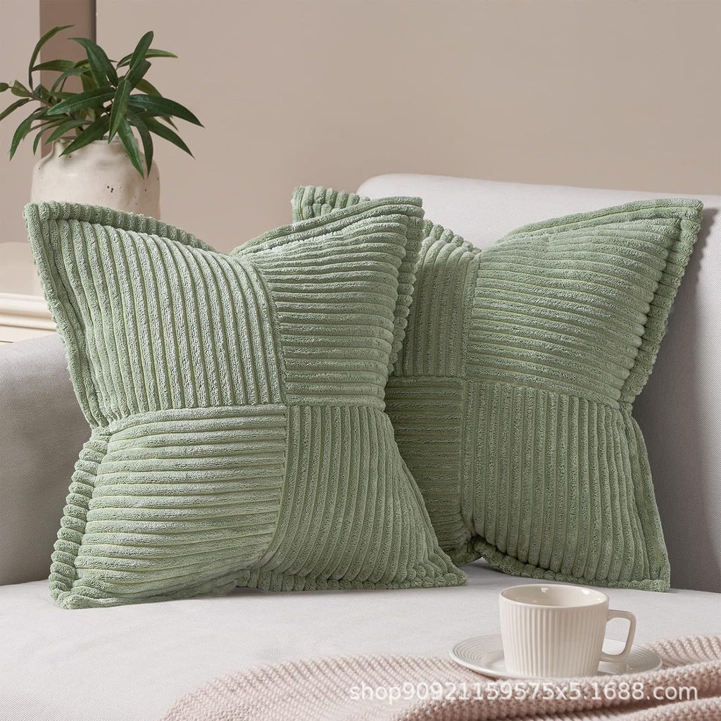 Light sage green corduroy pillow covers with soft striped texture, perfect for a calming and decorative couch accent.